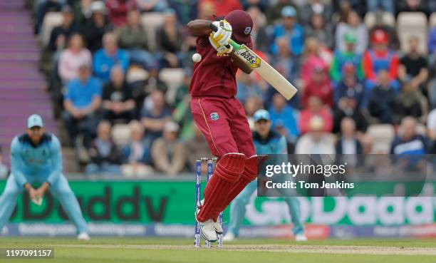 Chris Gayle of West Indies gets hits by a bouncer from Jofra Archer during the England v West Indies ICC Cricket World Cup match at the Hampshire...