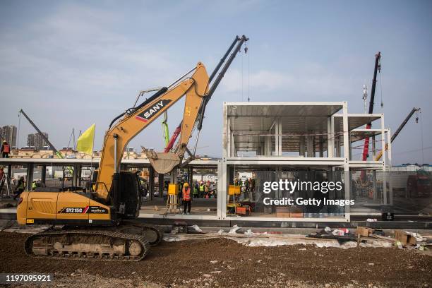 Construction is underway as new hospitals are built to tackle the coronavirus on January 28, 2020 in Wuhan, China. Wuhan Huoshenshan hospital will...