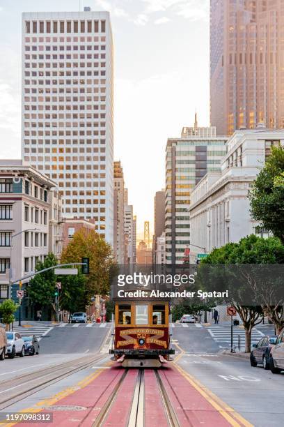 historic cable car on the street in san francisco, california, usa - san francisco californië stockfoto's en -beelden