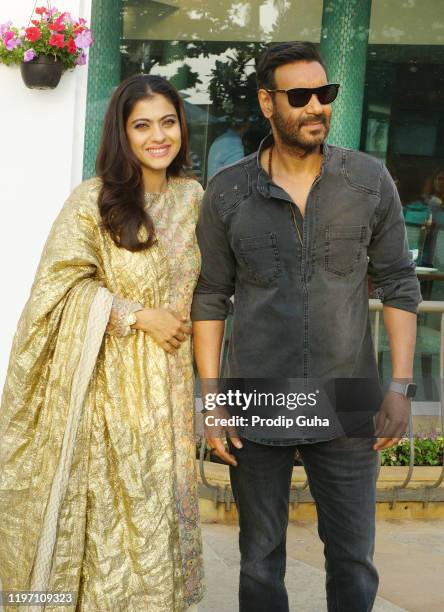 Kajol and Ajay Devgn attend the "Tanhaji" film Photocall on January 02,2020 in Mumbai, India