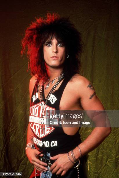 American songwriter, musician, and co-founder of the hard rock band Mötley Crüe, Nikki Sixx, poses for a portrait backstage at the Joe Louis Arena...