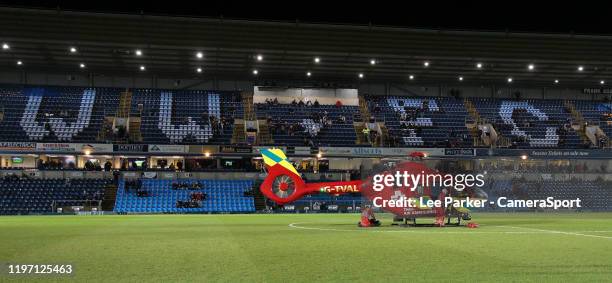 The Thames Valley Air Ambulance helicopter lands on the pitch at Adams Park, home of Wycombe Wanderers during the Sky Bet League One match between...