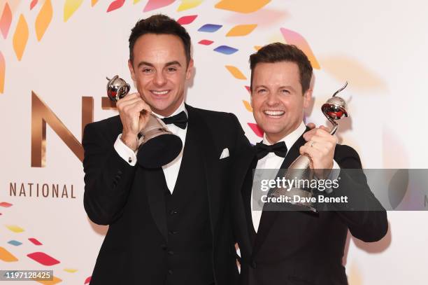 Anthony McPartlin and Declan Donnelly, winners of the Best TV Presenter award, pose in the winners room at the National Television Awards 2020 at The...