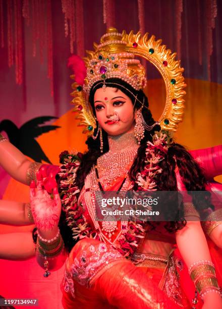 goddess durga, durga idol during durga puja festival, india. - hinduism stock pictures, royalty-free photos & images