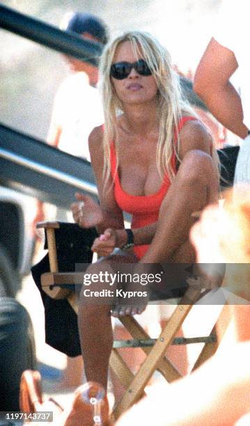 American actress Pamela Anderson on the set of the television series 'Baywatch', USA, circa 1995.