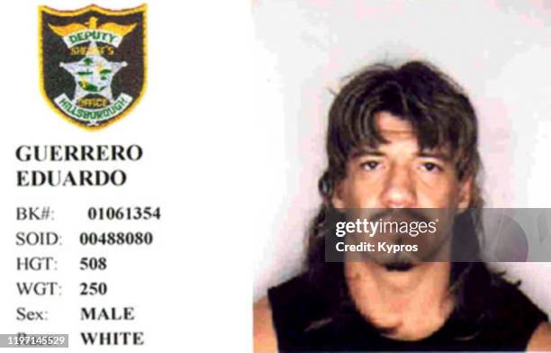 Mug shot of American wrestler Eduardo 'Eddie' Guerrero , following his arrest in Hillsborough County, Florida for drink driving, November 2001. He...