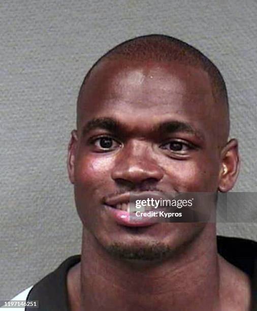 Mug shot of American football running back Adrian Peterson, following his arrest in Houston, Texas, July 2012. He was charged with resisting arrest...