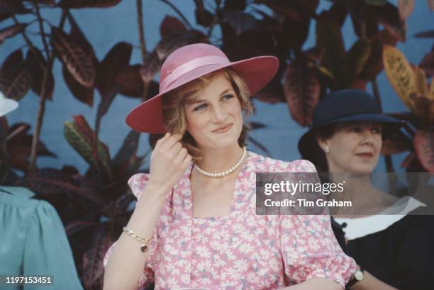 Diana, Princess of Wales at the Sydney Opera House in Sydney, Australia, 28th March 1983. She is wearing a pink dress with a floral pattern by...