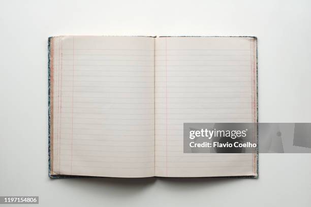 blank pages of an old notebook - lined paper fotografías e imágenes de stock