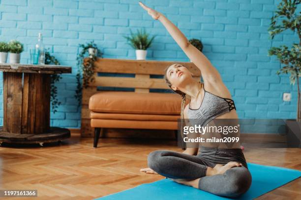 yoga - country club woman stock pictures, royalty-free photos & images