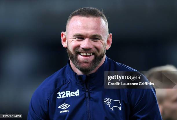 Wayne Rooney of Derby County warms up prior to the Sky Bet Championship match between Derby County and Barnsley at Pride Park Stadium on January 02,...