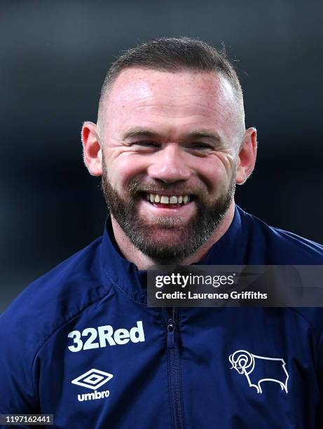 Wayne Rooney of Derby County warms up prior to the Sky Bet Championship match between Derby County and Barnsley at Pride Park Stadium on January 02,...