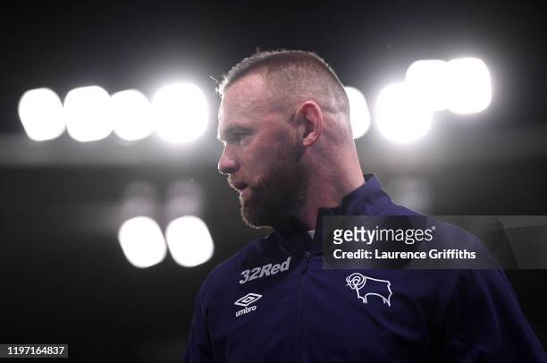 Wayne Rooney of Derby County looks on as he warms up prior to the Sky Bet Championship match between Derby County and Barnsley at Pride Park Stadium...