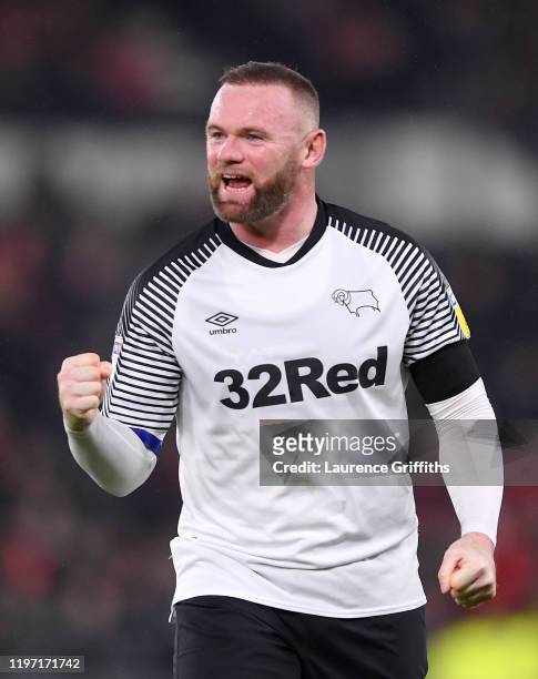Wayne Rooney of Derby County celebrates his sides first goal during the Sky Bet Championship match between Derby County and Barnsley at Pride Park...