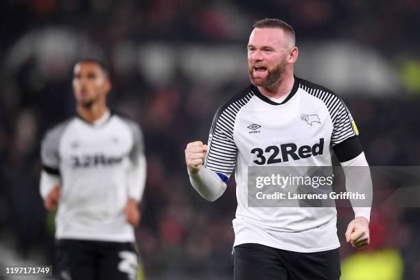 Wayne Rooney of Derby County celebrates his sides first goal during the Sky Bet Championship match between Derby County and Barnsley at Pride Park...