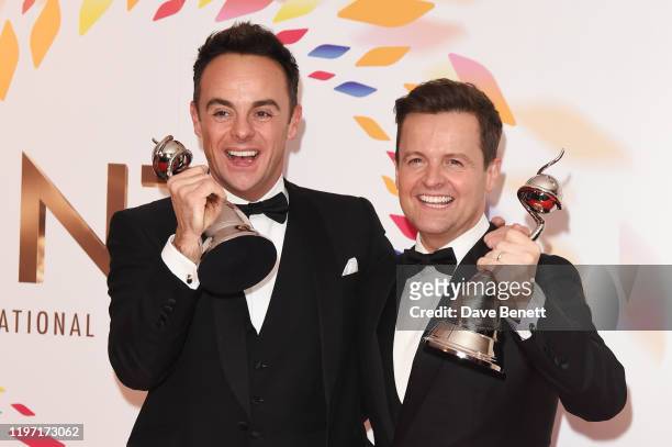 Anthony McPartlin and Declan Donnelly, winners of the Best TV Presenter award, pose in the winners room at the National Television Awards 2020 at The...