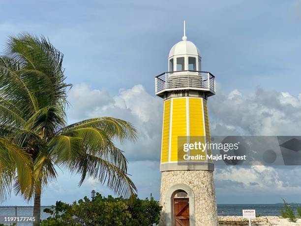 lighthouse at george town yacht club, grand cayman marina - george town stock pictures, royalty-free photos & images