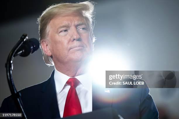 President Donald Trump looks on during a "Keep America Great" campaign rally at Wildwoods Convention Center in Wildwood, New Jersey, January 28, 2020.