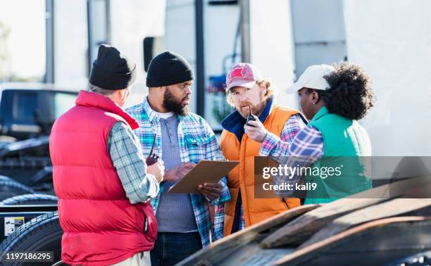 workers at trucking company having meeting - fleet manager stock pictures, royalty-free photos & images