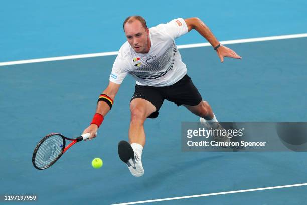Steve Darcis of Belgium plays a forehand during the Group C singles match between Steve Darcis of Belgium and Alexander Cozbinov of Moldova during...