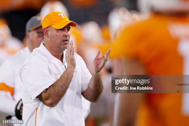 Head coach Jeremy Pruitt of the Tennessee Volunteers looks on in the first half of the TaxSlayer Gator Bowl against the Indiana Hoosiers at TIAA Bank...