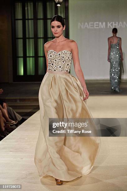 Model walks the runway wearing Naeem Khan at the 13th Annual Design Care Benefiting The HollyRod Foundation - Inside on July 23, 2011 in Beverly...