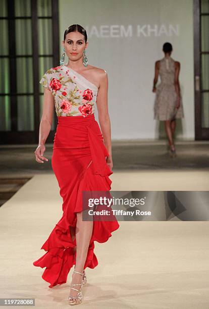 Model walks the runway wearing Naeem Khan at the 13th Annual Design Care Benefiting The HollyRod Foundation - Inside on July 23, 2011 in Beverly...