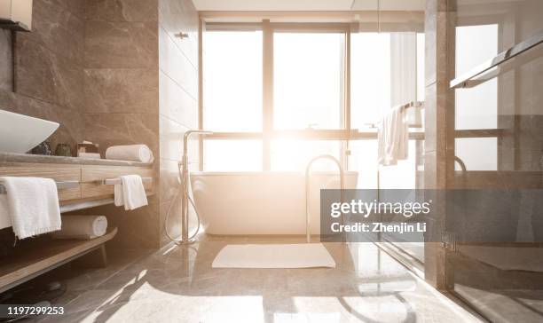 sunny indoor bath tub / chongqing, china - deko bad stock-fotos und bilder