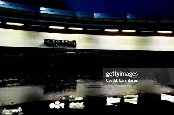 Justin Kripps, Benjamin Coakwell, Ryan Sommer and Cameron Stones of Canada compete during the BMW IBSF Bobsleight World Cup at Veltins Eis-Arena on...
