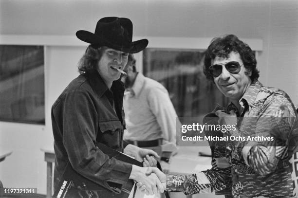 American satirical comedian Mort Sahl with radio talk show host Don Imus in a studio at WNBC in New York City, 1973. Sahl is promoting his new album,...