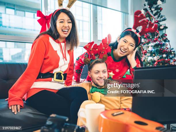 millennial christmas party - ugliness stock pictures, royalty-free photos & images