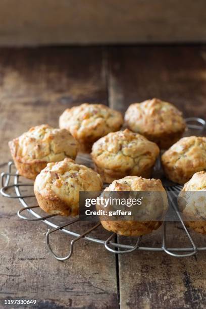 savory muffins with cheese and ham - savoury food stock pictures, royalty-free photos & images
