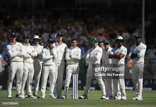 All 11 South Africa players look up to the big screen whilst a review takes place during Day One of the Second Test between England and South Africa...