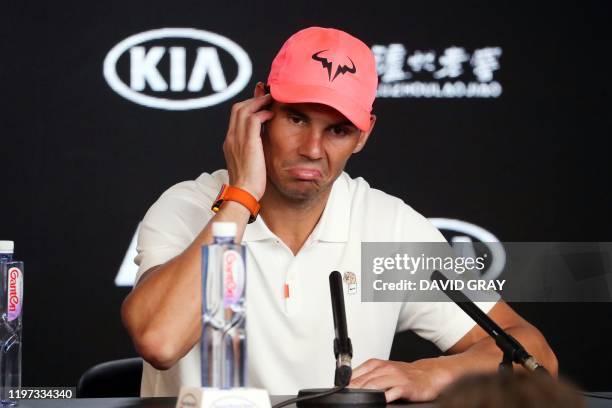 Spain's Rafael Nadal speaks at a press conference after losing his men's singles quarter-final match against Austria's Dominic Thiem on day ten of...