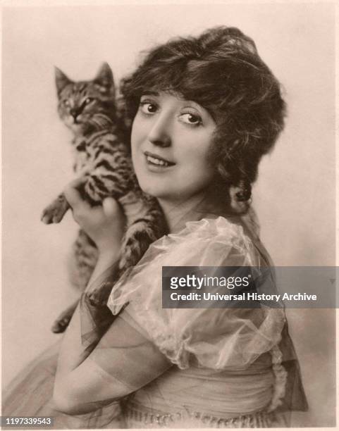 Actress Mabel Normand, Publicity Portrait with Cat, 1910.