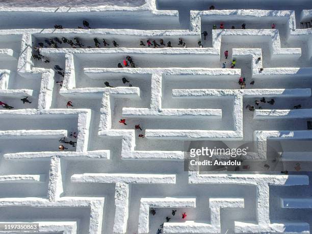 Drone view of visitors trying to find their way through the biggest snow maze of the world in in Zakopane, Poland on January 29, 2020. The snow maze...