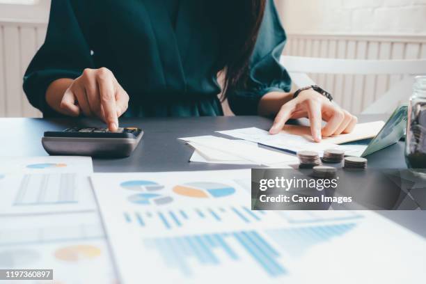accountant or banker calculate the cash bill. - vat stock pictures, royalty-free photos & images