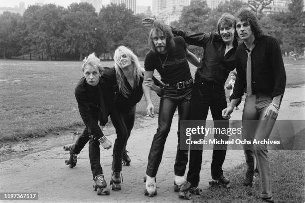 English heavy metal band Judas Priest in a photoshoot for 'Roller Disco' magazine, 1979. From left to right, they are lead vocalist Rob Halford,...
