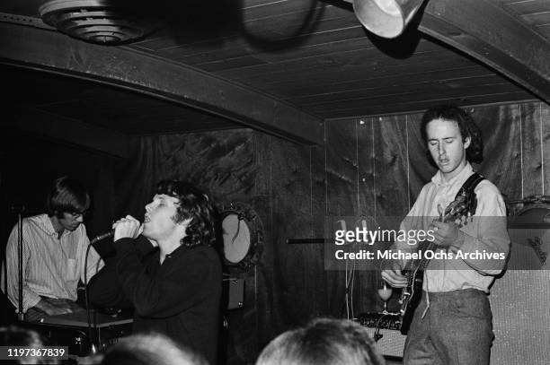 American rock band The Doors perform at the Ondine Club in New York City, November 1966. From left to right, keyboard player Ray Manzarek, singer Jim...