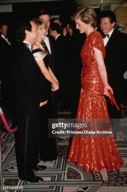 Diana, Princess of Wales meets actors Billy Crystal and Meg Ryan at the premiere of the film 'When Harry Met Sally' in London, UK, November 1989....