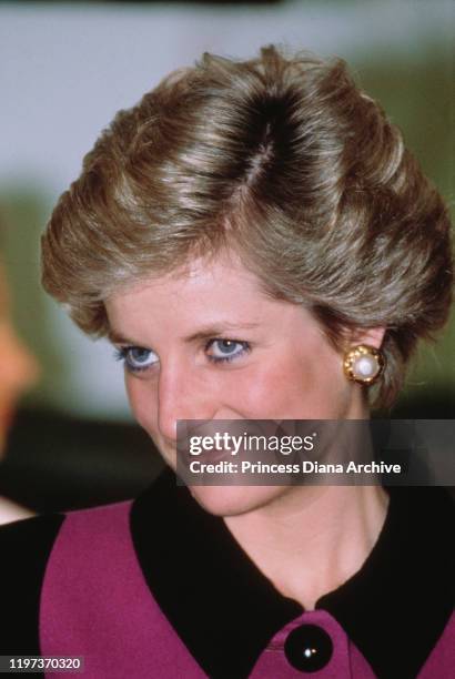 Diana, Princess of Wales wearing a suit by Catherine Walker to an exhibition at Olympia in London, 29th January 1990.