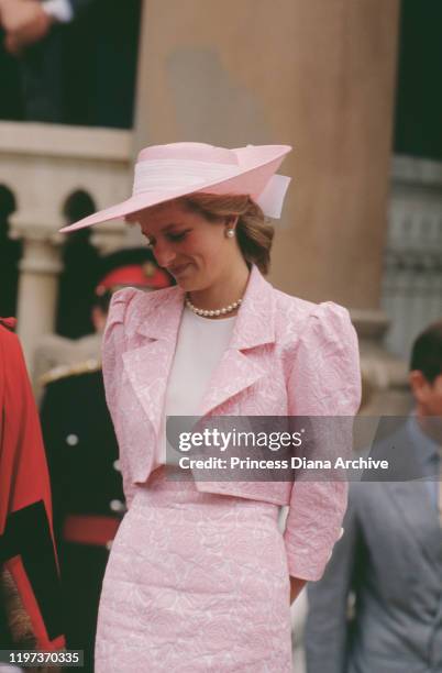 Diana, Princess of Wales wearing a pink suit by Catherine Walker and a matching Philip Somerville hat during a visit to Northampton to receive the...