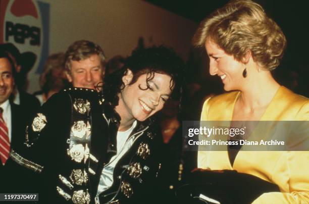 Diana, Princess of Wales meets singer Michael Jackson backstage at Wembley Stadium in London, before a concert by Jackson in aid of the Prince's...