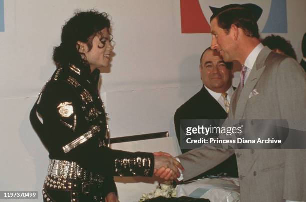 Prince Charles meets singer Michael Jackson backstage at Wembley Stadium in London, before a concert by Jackson in aid of the Prince's Trust charity,...