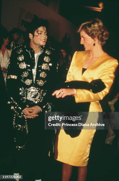 Diana, Princess of Wales meets singer Michael Jackson backstage at Wembley Stadium in London, before a concert by Jackson in aid of the Prince's...