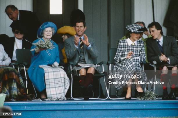 The Queen Mother, Prince Charles and Diana, Princess of Wales at the Braemar Games, a Highland Games Gathering in Braemar, Scotland, September 1989....