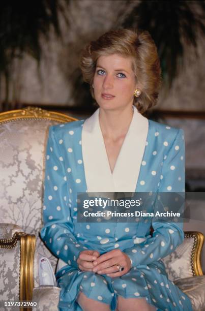 Diana, Princess of Wales during an audience with the Emir of Kuwait at Bayan Palace in Bayan, Kuwait, March 1989. She is wearing a blue and white...