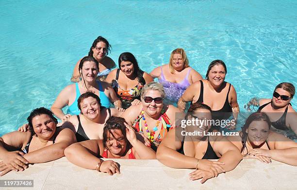 Some participant of 22nd edition of the Italian 'Miss Cicciona' competition pose for a photo backstage on July 23, 2011 in Pisa, Italy.