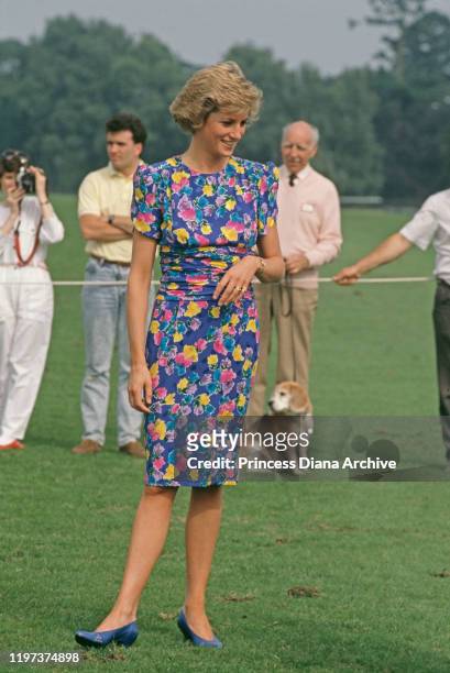 Diana, Princess of Wales attends a charity polo match sponsored by 'Hello' magazine at the Guards Polo Club in Windsor, UK, 29th June 1988. She is...