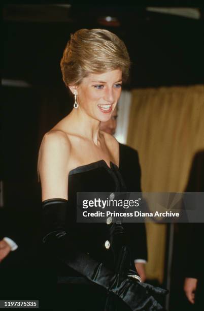 Diana, Princess of Wales at the premiere of the film 'Dangerous Liaisons' in London, 6th March 1989. She is wearing a black evening gown by Victor...